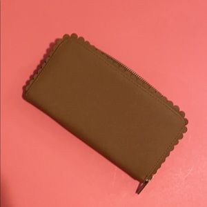 Scalloped edged tan wallet